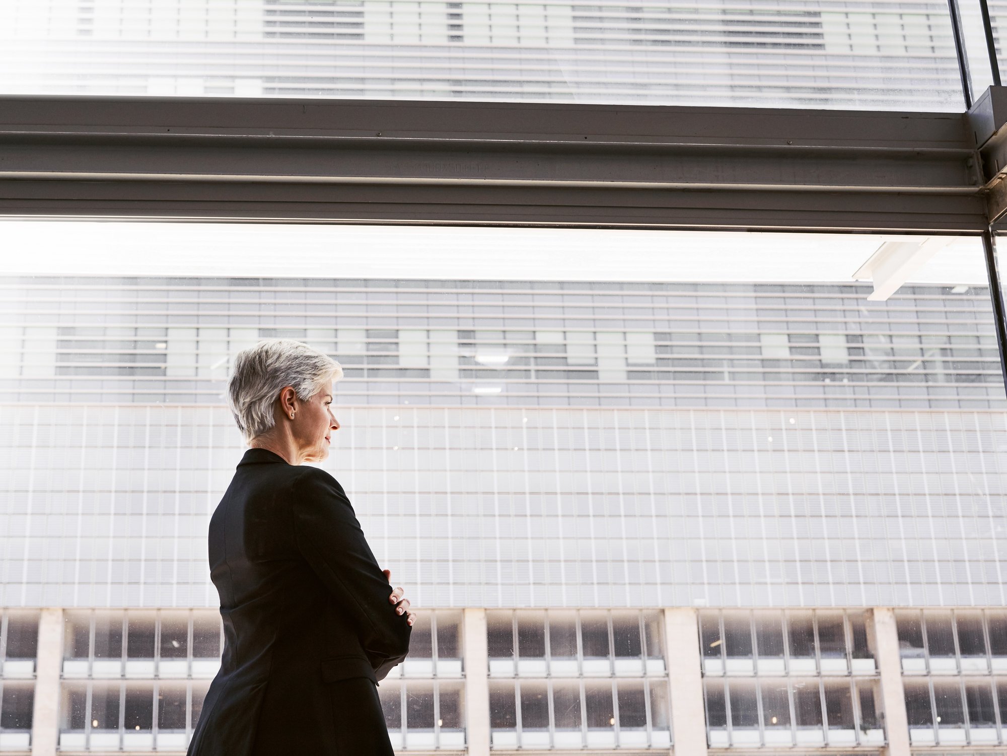 full-length-woman-standing-against-building